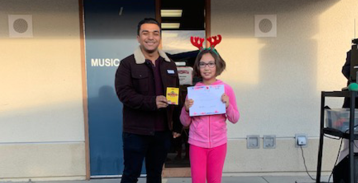 Pictured: (Left to Right) Newport Pacific Land Representative Nico Gonzalez and Freedom Crest Elementary Student Danielle Everett 